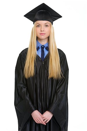Portrait of young woman in graduation gown Foto de stock - Super Valor sin royalties y Suscripción, Código: 400-06772937