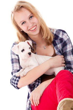 people animal cuddle - Young girl having a great time with the puppies Stock Photo - Budget Royalty-Free & Subscription, Code: 400-06787393