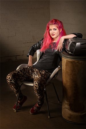 portable chair not people - Young punk woman in leopard skin tights indoors Stock Photo - Budget Royalty-Free & Subscription, Code: 400-06788310