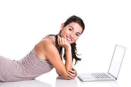 study online at home - Happy student lying in the floor working in a laptop, isolated over a white background Stock Photo - Budget Royalty-Free & Subscription, Code: 400-06788351