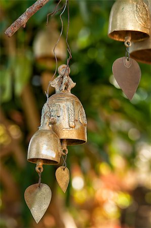 Tradition buddhist wishing bells on a tree in Thailand Stock Photo - Budget Royalty-Free & Subscription, Code: 400-06788546