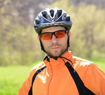 Portrait of Young Cyclist in Helmet and Glasses Photographie de stock - Aubaine LD & Abonnement, Code: 400-06788685