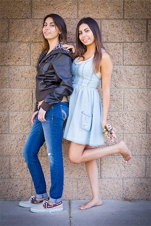 simsearch:400-05734883,k - Two Beautiful Mixed Race Twin Sisters Portrait Outdoors. Stock Photo - Budget Royalty-Free & Subscription, Code: 400-06788881