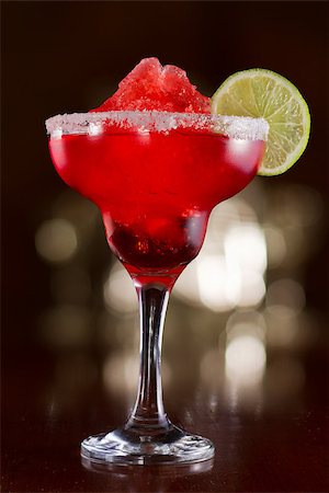 salt rim - strawberry margarita on a bar top with a busy out of focus background Stock Photo - Budget Royalty-Free & Subscription, Code: 400-06789389