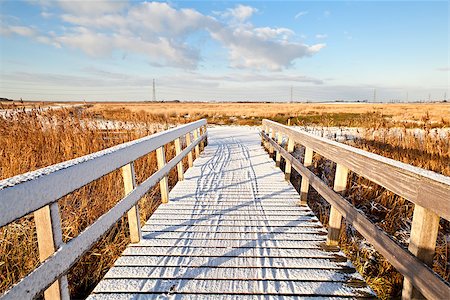 snow road horizon - wooden bridge for bicycles in snow at winter Stock Photo - Budget Royalty-Free & Subscription, Code: 400-06789537