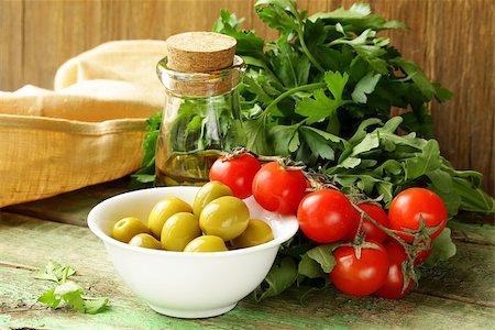 simsearch:400-06096133,k - still life of green  marinated olives,  herbs, cherry tomatoes Fotografie stock - Microstock e Abbonamento, Codice: 400-06794255