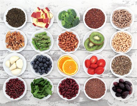 Large super food selection in white porcelain dishes over distressed white wooden background. Fotografie stock - Microstock e Abbonamento, Codice: 400-06794502