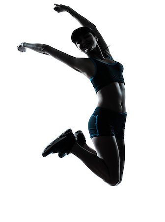 simsearch:400-06768313,k - one caucasian woman runner jogger jumping happy jumping in silhouette studio isolated on white background Photographie de stock - Aubaine LD & Abonnement, Code: 400-06794907