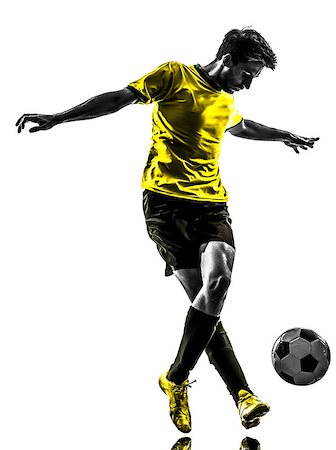 one brazilian soccer football player young man dribbling in silhouette studio  on white background Foto de stock - Super Valor sin royalties y Suscripción, Código: 400-06794919