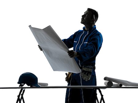silhouette as carpenter - one caucasian man construction  Architect working plans silhouette in studio on white background Stock Photo - Budget Royalty-Free & Subscription, Code: 400-06794944