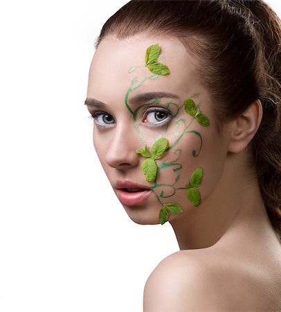 close-up portrait of pretty girl with nacked shoulders, creative fresh summer make-up with mint leaves Stock Photo - Budget Royalty-Free & Subscription, Code: 400-06795075