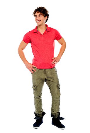 simsearch:400-06795514,k - Handsome guy looking away with arms on his waist Photographie de stock - Aubaine LD & Abonnement, Code: 400-06795528