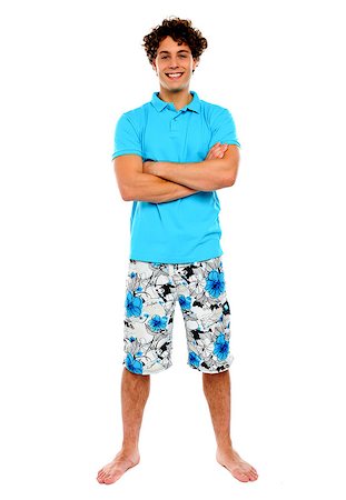 swimsuit model white background - Teenage guy posing in casuals. Holiday concept Foto de stock - Super Valor sin royalties y Suscripción, Código: 400-06795534