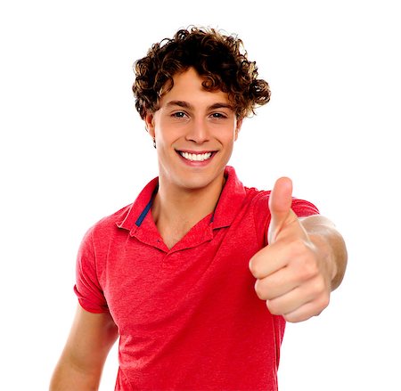 simsearch:400-06795514,k - Handsome young man gesturing thumbs-up isolated on white Photographie de stock - Aubaine LD & Abonnement, Code: 400-06795530