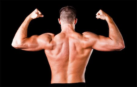 simsearch:400-05082999,k - Muscular man isolated on black background Stock Photo - Budget Royalty-Free & Subscription, Code: 400-06795968