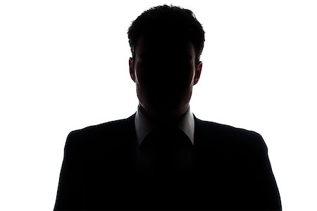 Businessman portrait silhouette and a misterious face Stock Photo - Budget Royalty-Free & Subscription, Code: 400-06795987