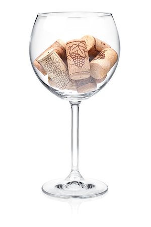 simsearch:400-08035611,k - Wine collection - Corks in wine glass. Isolated on white background Stock Photo - Budget Royalty-Free & Subscription, Code: 400-06796078