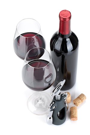 simsearch:400-06796159,k - Red wine, corks and corkscrew. Isolated on white background, view from above, focus on glasses. Stock Photo - Budget Royalty-Free & Subscription, Code: 400-06796090