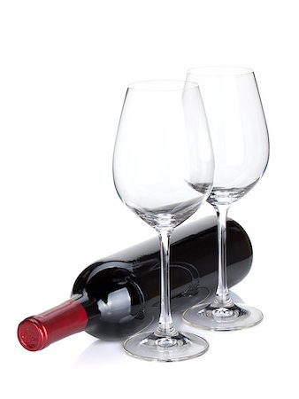 simsearch:400-06796159,k - Red wine bottle and empty glasses. Isolated on white background Stock Photo - Budget Royalty-Free & Subscription, Code: 400-06796155