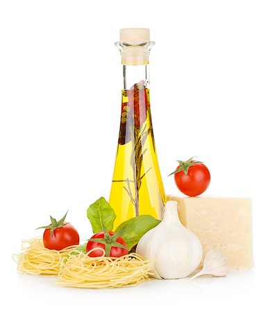 simsearch:400-06796271,k - Pasta, tomatoes, basil, olive oil, garlic and parmesan cheese. Isolated on white background Stock Photo - Budget Royalty-Free & Subscription, Code: 400-06796262
