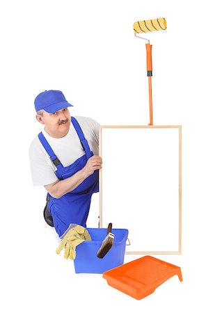 simsearch:400-06741696,k - House painter and hollow frame over white background Photographie de stock - Aubaine LD & Abonnement, Code: 400-06797090