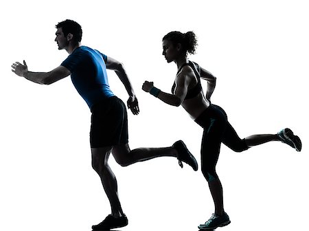 simsearch:400-06768313,k - one caucasian couple man woman personal trainer coach runner running jogging sprinting silhouette studio isolated on white background Photographie de stock - Aubaine LD & Abonnement, Code: 400-06797224