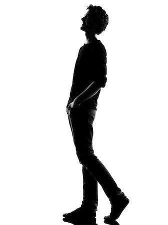 simsearch:400-06794896,k - young man  walking  happy laughing silhouette in studio isolated on white background Stock Photo - Budget Royalty-Free & Subscription, Code: 400-06797279