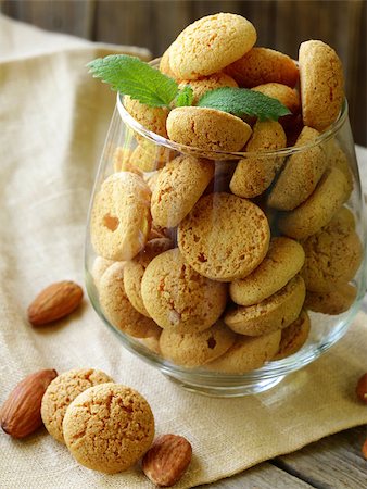 sweet almond cookies biscuits (amaretti) on the table Stock Photo - Budget Royalty-Free & Subscription, Code: 400-06797302