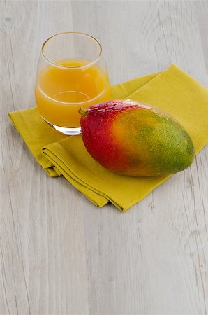 exotic fruity alcoholic drinks - Fresh mango juice and mango fruit Stock Photo - Budget Royalty-Free & Subscription, Code: 400-06797393