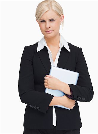 simsearch:400-06802290,k - Serious businesswoman holding a tablet against white background Stock Photo - Budget Royalty-Free & Subscription, Code: 400-06797755
