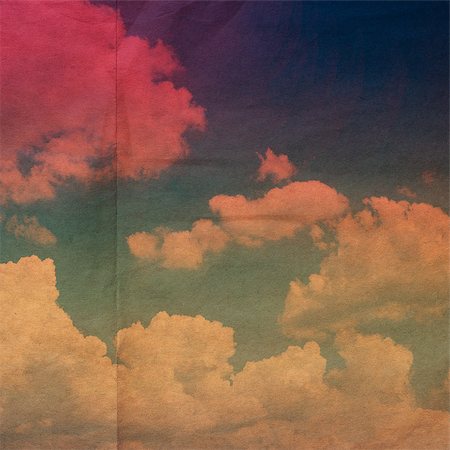 clouds on a textured vintage paper background, with grunge stains Foto de stock - Super Valor sin royalties y Suscripción, Código: 400-06798339