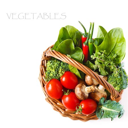 Fresh kitchen garden vegetables in a basket on a white background. Stock Photo - Budget Royalty-Free & Subscription, Code: 400-06798792