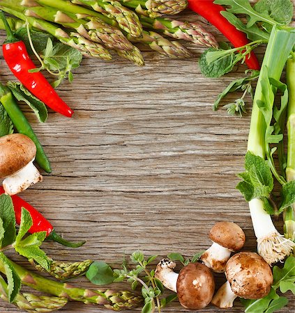 simsearch:400-06700975,k - Frame of fresh vegetables and herbs on a wooden background. Stock Photo - Budget Royalty-Free & Subscription, Code: 400-06798802