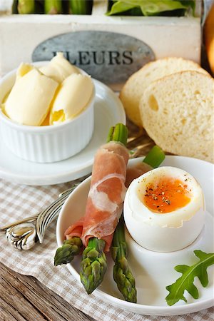 simsearch:400-04342843,k - Asparagus in bacon and boiled egg for breakfast. Photographie de stock - Aubaine LD & Abonnement, Code: 400-06798820