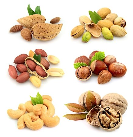 Collection of nuts on a white background Stock Photo - Budget Royalty-Free & Subscription, Code: 400-06799031