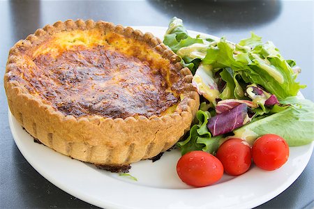 simsearch:400-06798929,k - Quiche Lorraine Pasty with Mixed Green and Tomatoes Salad Stock Photo - Budget Royalty-Free & Subscription, Code: 400-06799171