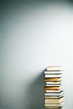 Very high stack of books on a table Stock Photo - Budget Royalty-Free & Subscription, Code: 400-06799205