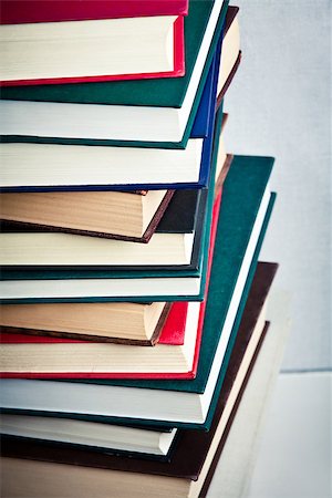 simsearch:400-05145983,k - Closeup of a Very high stack of books on a table Stock Photo - Budget Royalty-Free & Subscription, Code: 400-06799206