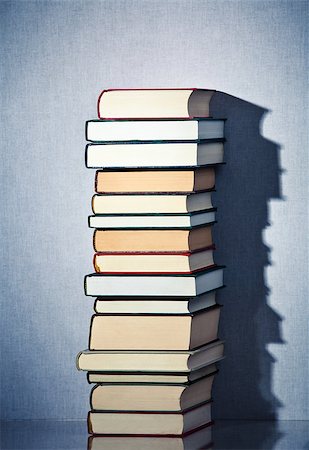 scientific research old - Very high stack of books on a table Stock Photo - Budget Royalty-Free & Subscription, Code: 400-06799208