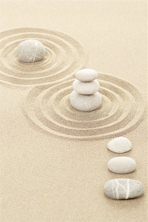 Balance of three zen stones in sand Stock Photo - Budget Royalty-Free & Subscription, Code: 400-06799235