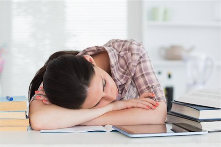 Woman leaning on the table in a kitchen Stock Photo - Budget Royalty-Free & Subscription, Code: 400-06799445