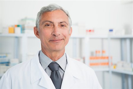 smiling chemist wearing lab coat in hospital Stock Photo - Budget Royalty-Free & Subscription, Code: 400-06799692