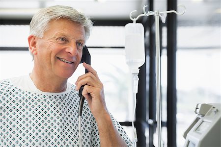 photo of patient in hospital in usa - Patient on payphone in hospital corridor Stock Photo - Budget Royalty-Free & Subscription, Code: 400-06799769