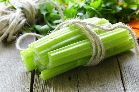 fresh celery sticks on a wooden table, rustic style Stock Photo - Budget Royalty-Free & Subscription, Code: 400-06790139