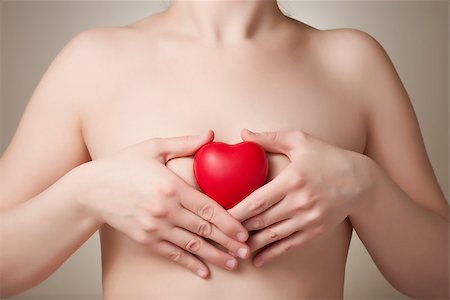 skin disease - Woman with a red heart shape Stock Photo - Budget Royalty-Free & Subscription, Code: 400-06790153