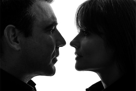simsearch:400-07097695,k - one caucasian couple woman man face to face in silhouette studio isolated on white background Stock Photo - Budget Royalty-Free & Subscription, Code: 400-06790333