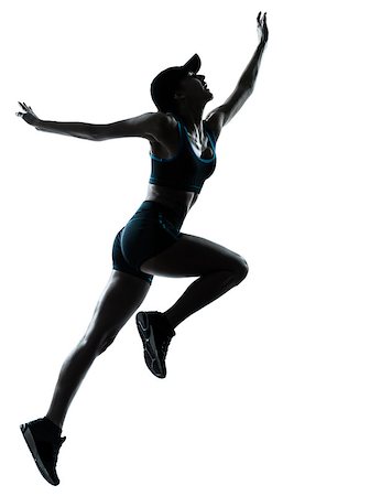 simsearch:400-06768313,k - one caucasian woman runner jogger jumping in silhouette studio isolated on white background Photographie de stock - Aubaine LD & Abonnement, Code: 400-06790387