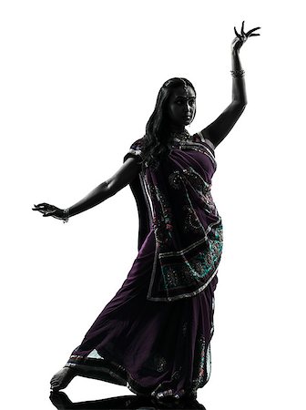 simsearch:400-06748271,k - one indian woman dancer dancing in silhouette studio isolated on white background Stockbilder - Microstock & Abonnement, Bildnummer: 400-06790398