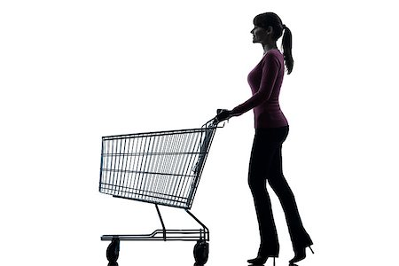 empty shopping cart - one caucasian woman with empty shopping cart in silhouette studio isolated on white background Photographie de stock - Aubaine LD & Abonnement, Code: 400-06790390