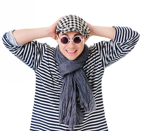 rogues - Young stylish twister man in striped clothes isolated on white background Stockbilder - Microstock & Abonnement, Bildnummer: 400-06790486